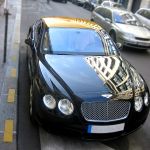 thumbnail image of Bentley and Aston Martin with the Golden roof